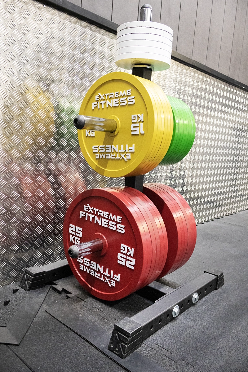 Competition barbell and calibrated plates at Iron Raven, Tonbridge