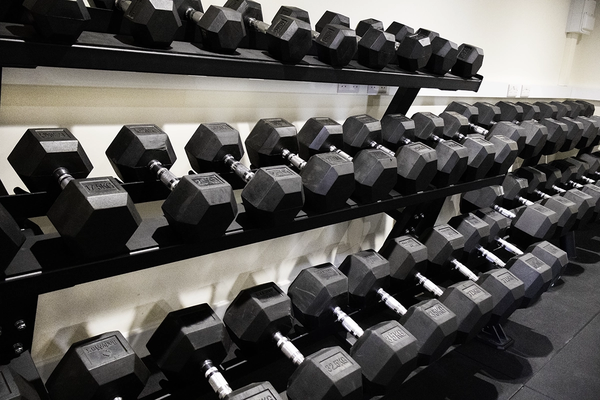 Dumbbells up to 70kg in the dumbbell room at Iron Raven gym, Kent