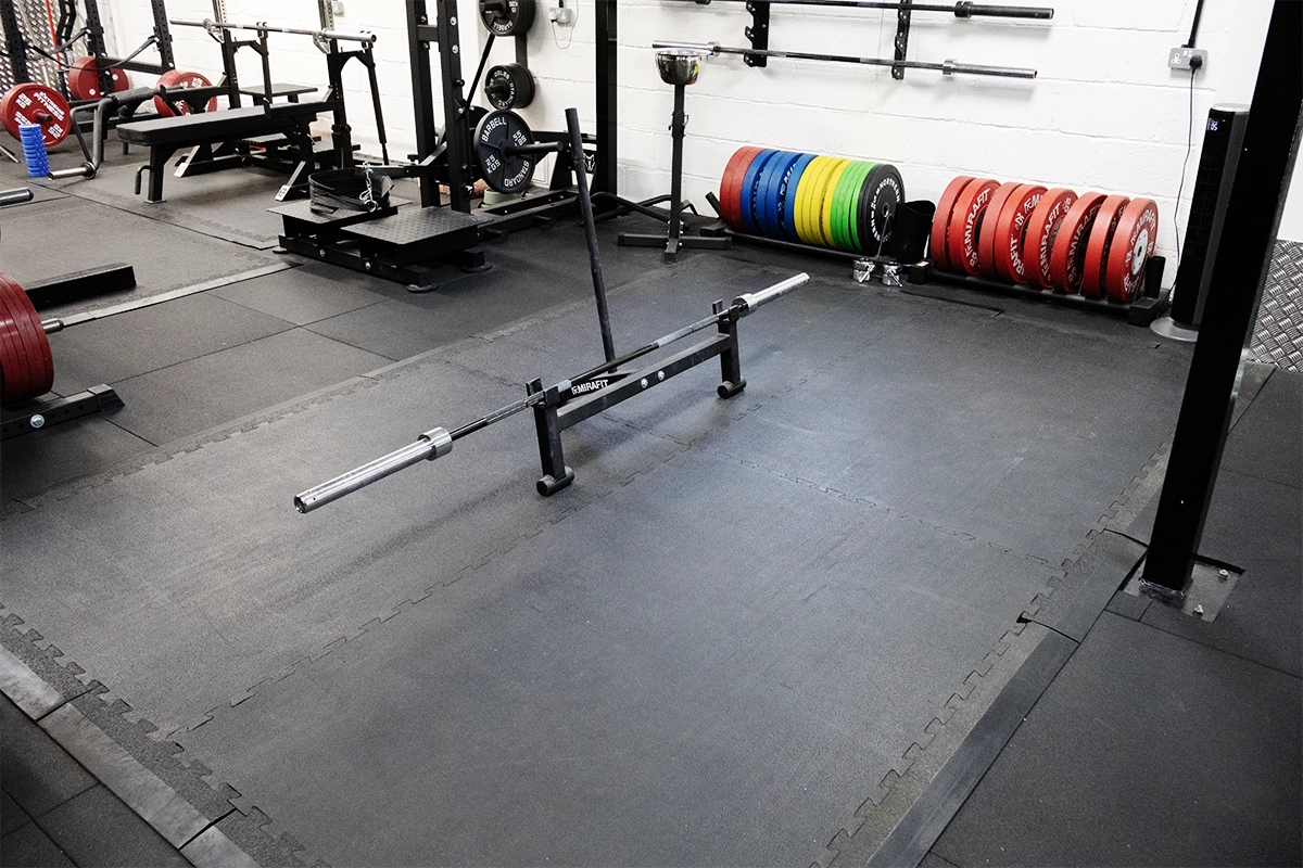 Training floor and deadlift platforms at Iron Raven powerlifting gym, Tonbridge